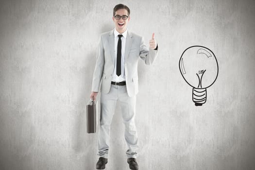 Handsome businessman showing thumbs up against white background