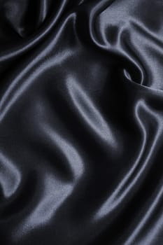 Smooth elegant dark grey silk or satin can use as background 