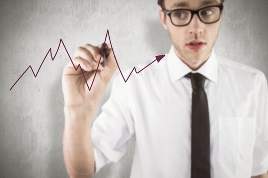 Geeky businessman writing with marker against white background