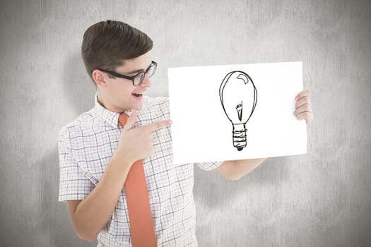 Geeky hipster smiling and showing card against white background