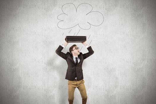 Young geeky businessman holding briefcase against white background