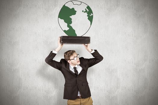 Young geeky businessman holding briefcase against white background