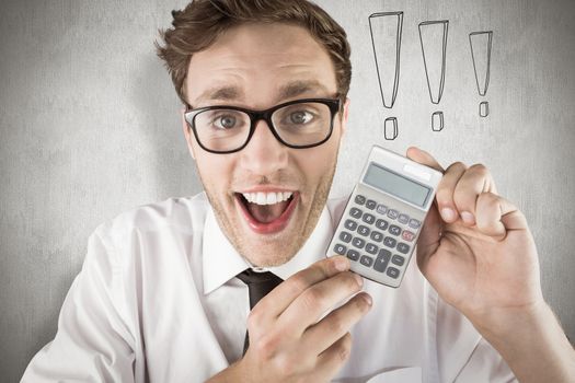 Geeky businessman showing a calculator against white background