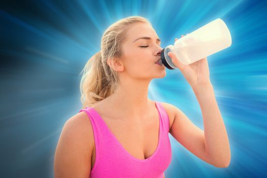 Beautiful healthy woman drinking water against abstract background