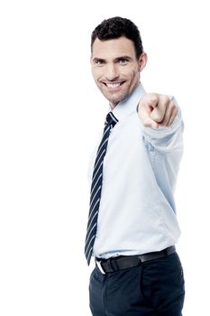 Male executive pointing his finger towards camera