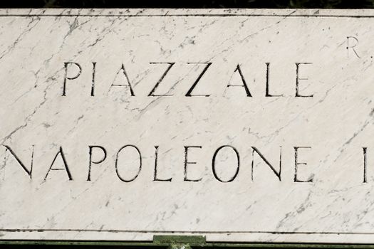 The marble plaque with the name of the street, Piazzale Napoleone, Rome, Italy.