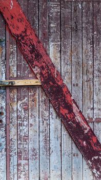 Picture of an  Old    wooden door with peeled paint