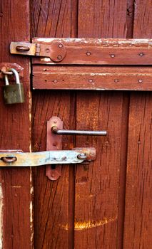 Picture of an  Old    wooden door with peeled paint