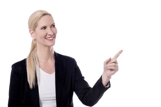 Corporate woman pointing at something 