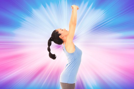 Fit brunette stretching her arms against abstract background
