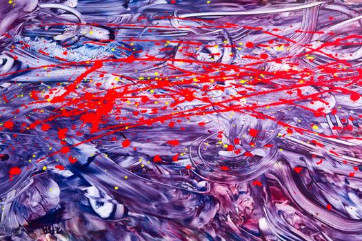 Dynamic purple and red abstract design created by two young children blending and splattering paint in creative originality, full frame background viewed low angle