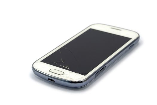 Broken smart phone isolated on white background
