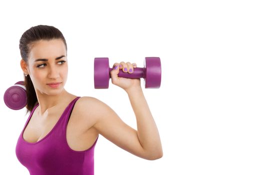 Beautiful girl with purple top and purple dumbbells isolated on white background with copy space. Lady fitness, girls only.