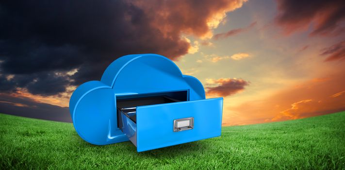 Cloud computing drawer against green field under orange sky