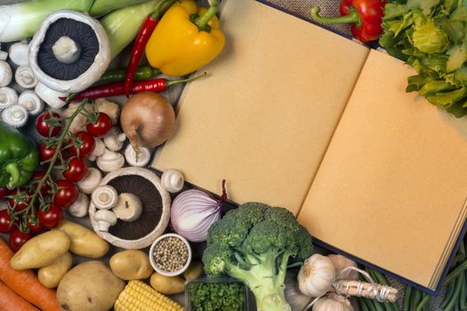 Fresh vegetables and recipe book with blank pages - Space for your Text