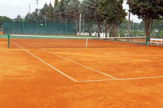 empty tennis court in clay