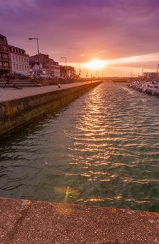 FECAMP, FRANCE - JUNE 12, 2014: City skyline at sunset. The town is visited by more than half a million people annually.