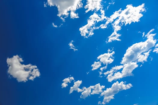 White clouds on blue sky background