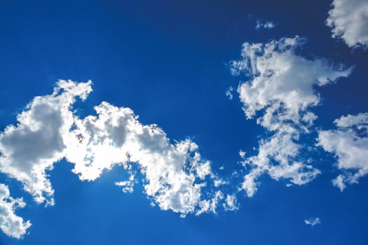 White clouds on blue sky background