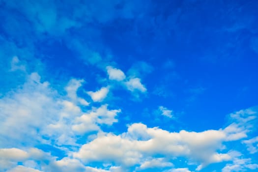 White clouds on blue sky background