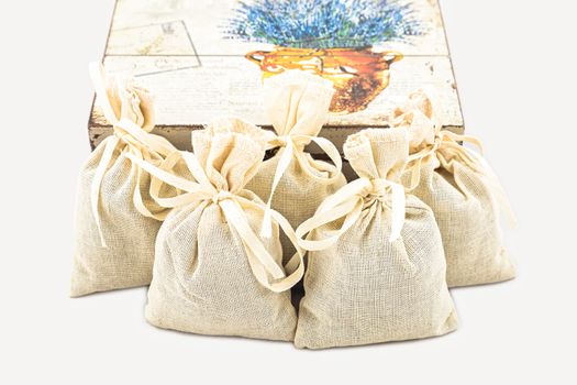 Textile sachet pouches with gift box on white background