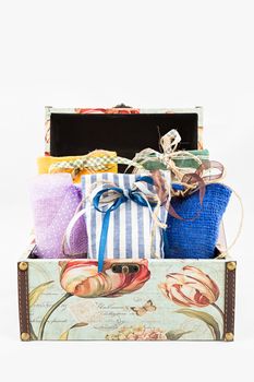 Decorative textile sachet pouches in gift box on white background