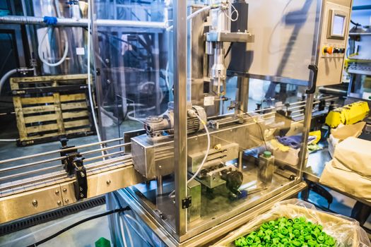 Automatic packing line of conveyor. Pharmaceutical and chemical industry. Manufacture on factory
