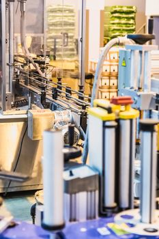 Automatic packing line of conveyor. Pharmaceutical and chemical industry. Manufacture on factory
