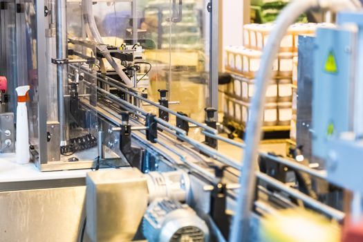 Automatic packing line of conveyor. Pharmaceutical and chemical industry. Manufacture on factory