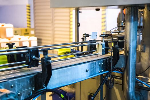 Automatic packing line of conveyor. Pharmaceutical and chemical industry. Manufacture on factory
