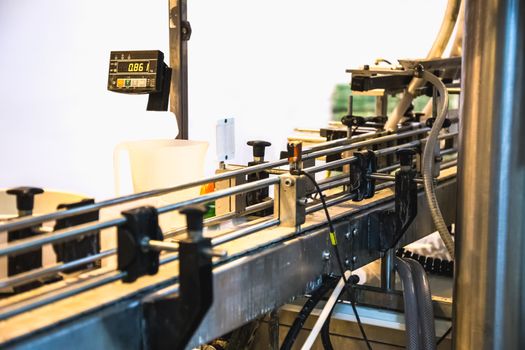 Automatic packing line of conveyor. Pharmaceutical and chemical industry. Manufacture on factory