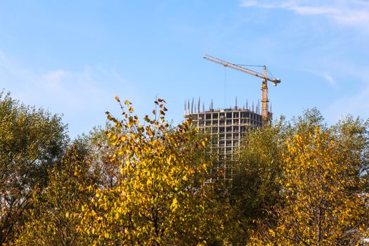 Building crane on construction of city