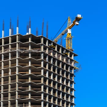 Building construction on blue sky background