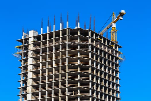 Building construction on blue sky background