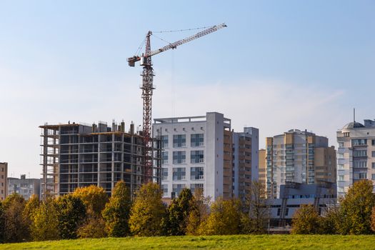 Building crane on construction of city