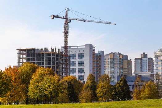 Building crane on construction of city