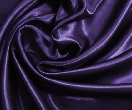 Smooth elegant lilac silk or satin as background 