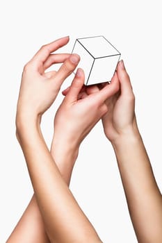 Hands holding white cube on white background