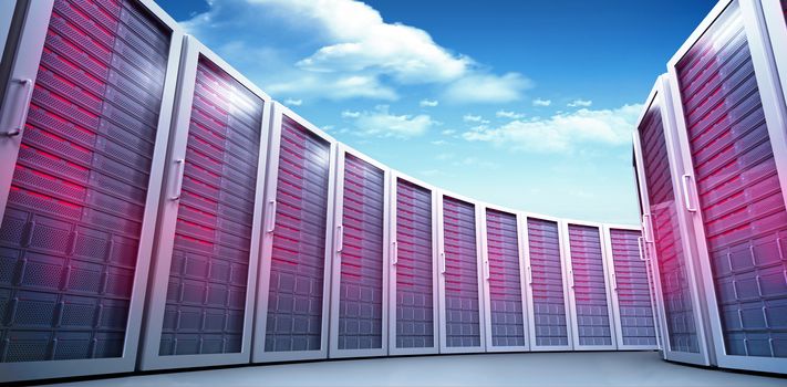 Server towers against bright blue sky with clouds