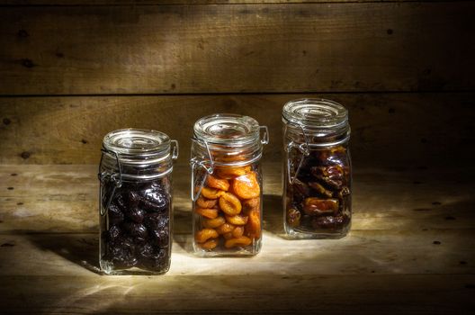 Still life with dried fruits - apricots, prunes and dates