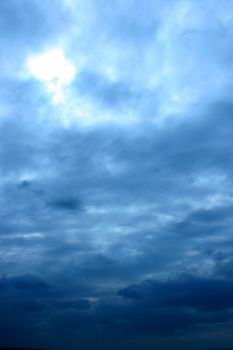 Dark clouds appearing before the storm begins.