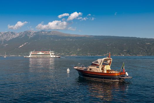 Lake Garda is the largest lake in Italy. It is located in Northern Italy, about half-way between Brescia and Verona, and between Venice and Milan.