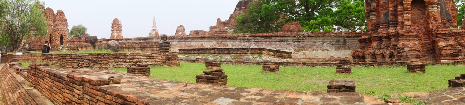 Ancient Buddha statue at Wat Yai Chaimongkol in the historical city, Ayutthaya, Thailand