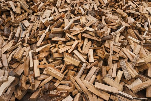 Pile of split fire wood prepared for winter burning