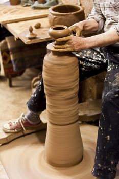 Potters hands forming clay on wheel in Cappadocia Turkey