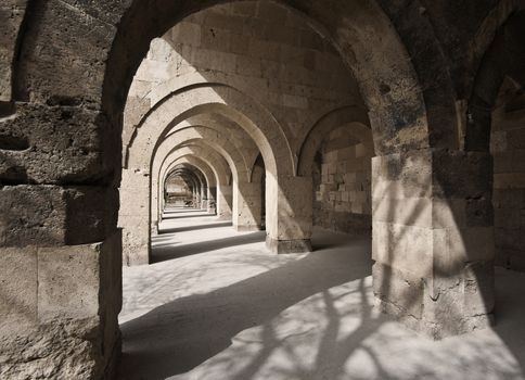 Stone hallway in Turkish Caravanserai in Cappadocia