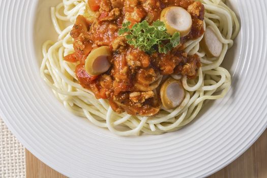 Spaghetti pasta with tomato beef sauce on dish