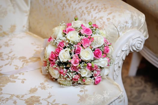 bridal bouquet lying on the sofa.