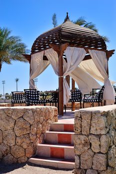 Beautiful wooden gazebo in the Egyptian hotel.