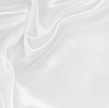 Smooth elegant white silk or satin texture can use as wedding background